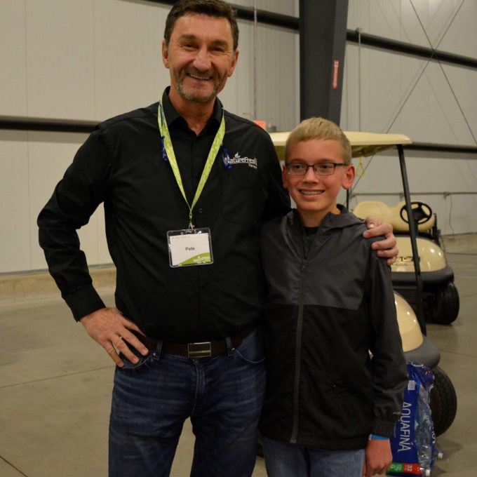 Pete Quiring makes a friend at the Delta Ohio Open House 