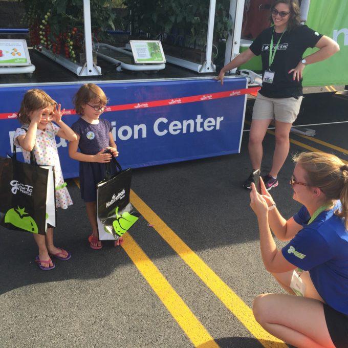 Molly taking a photo of some of our youngest fans! 