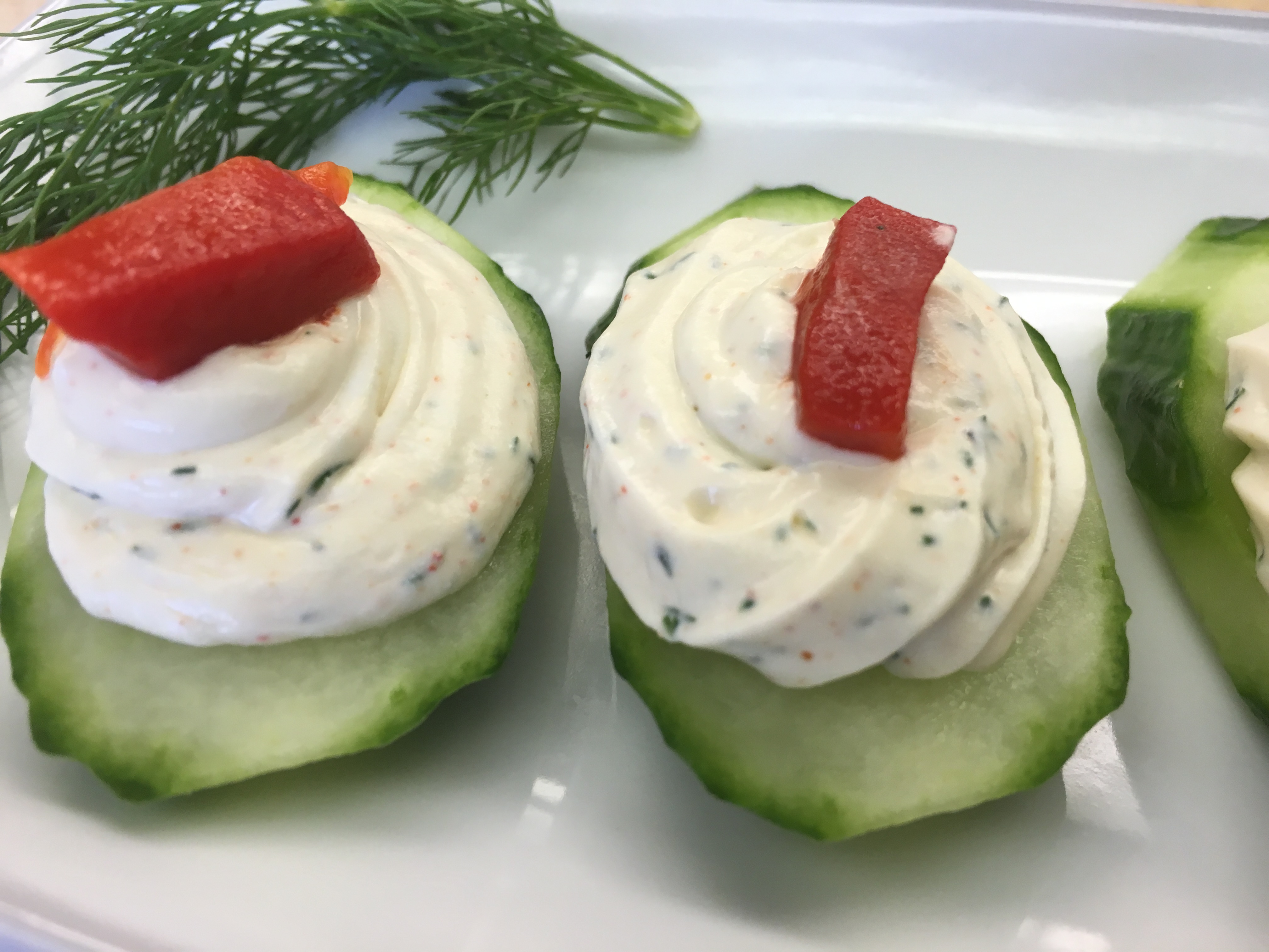 Cucumber canape with herbed cream cheese