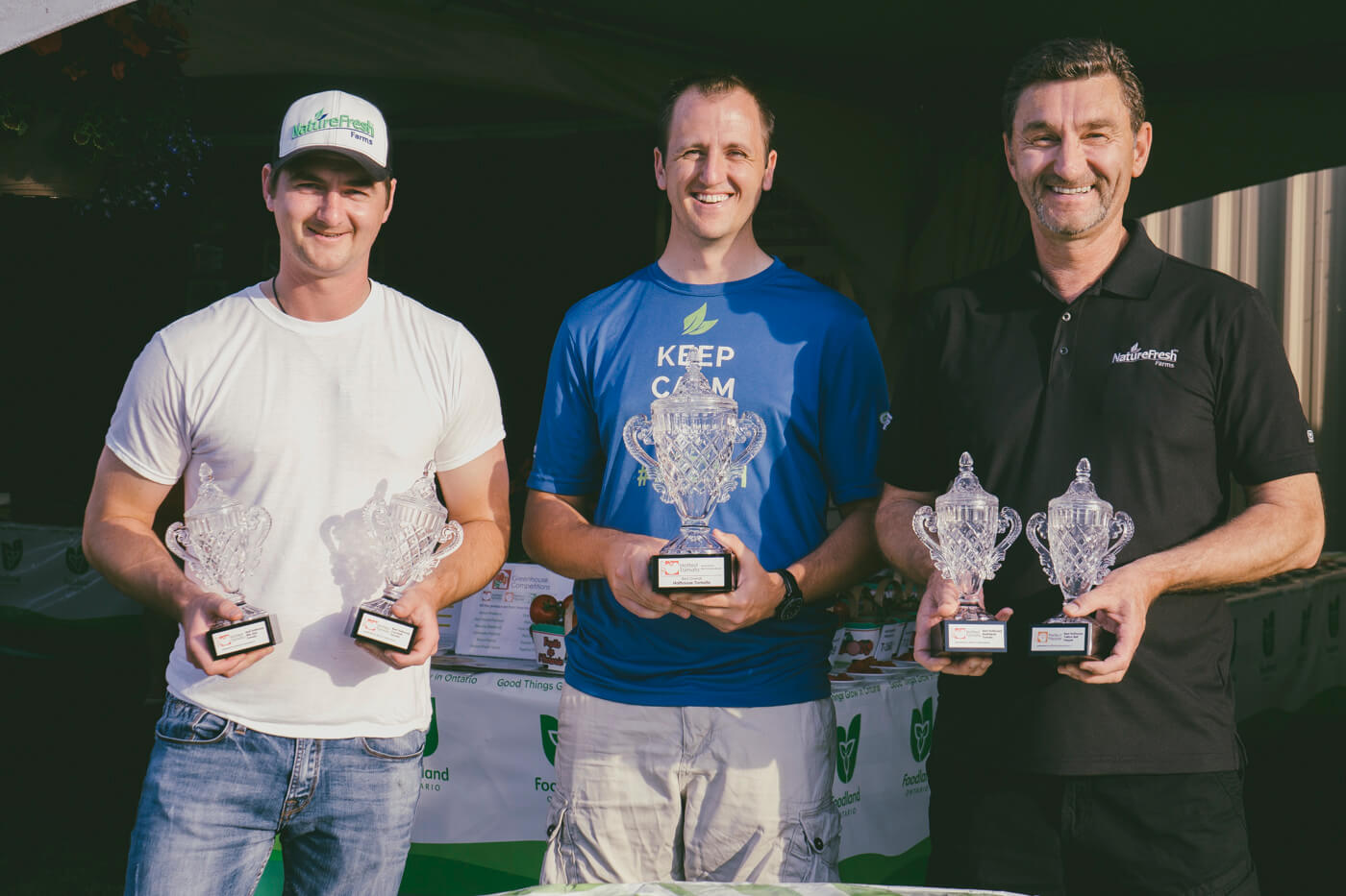 NatureFresh Farms' Matt Quiring, Benny Teichroeb, and Peter Quiring with awards