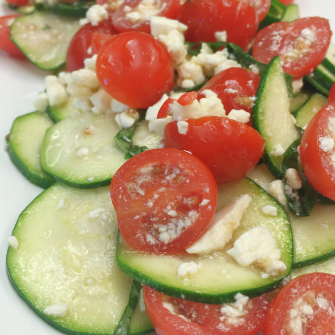 With white balsamic vinegar and feta cheese, this salad provides the perfect tangy twist to the candy-like Red Cherry Tomatoes and earthy zucchini!