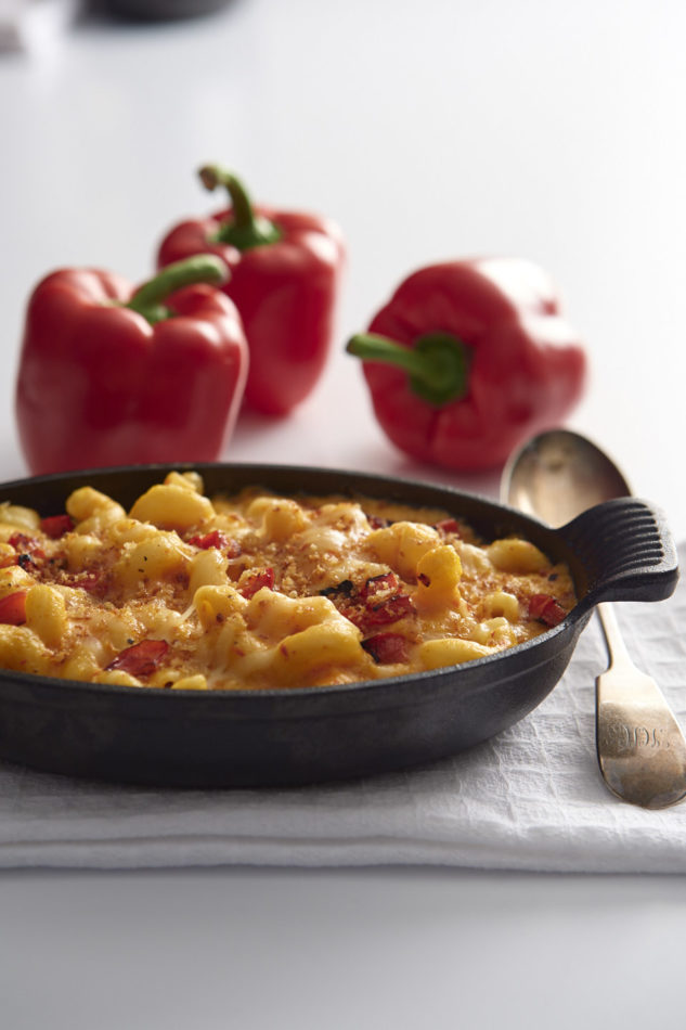 Roasted Bell Pepper Mac and Cheese served in a cast iron dish