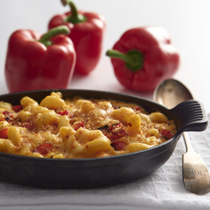 Roasted Bell Pepper Mac and Cheese served in a cast iron dish