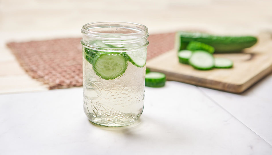 Cucumber water served in a mason jar
