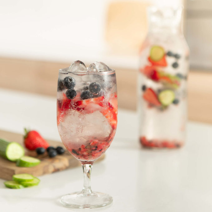 Mixed Berry & Cucumber Bellini Mocktail with fresh berries