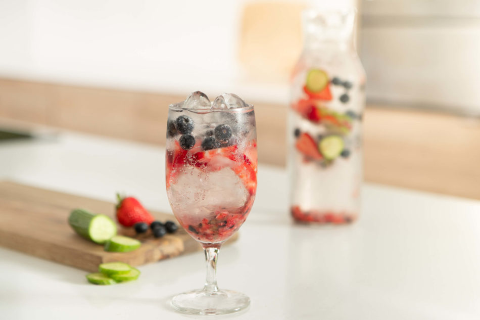 Mixed Berry & Cucumber Bellini Mocktail with fresh berries
