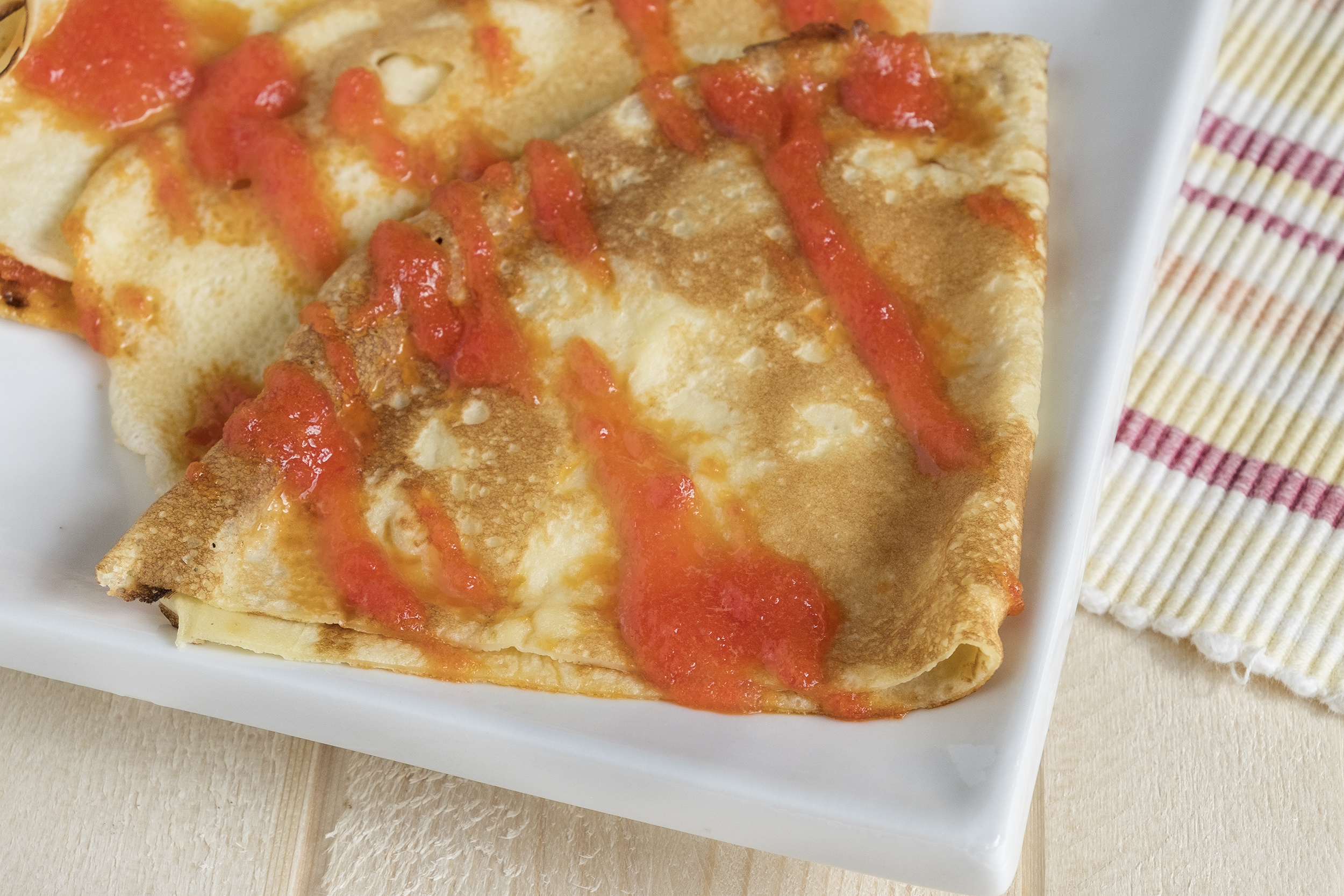 Get ready to smile with your mouth full! This recipe takes a breakfast and dessert favorite and turns it into a light and delicious crêpe.
